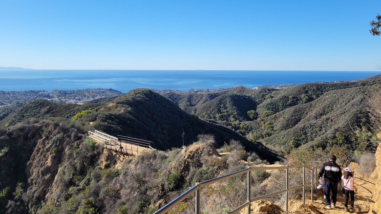 Trail along Will Rogers State Historic Park in California, with two people hiking
