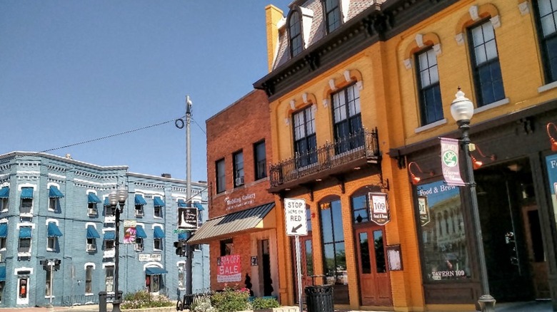 The colorful historic buildings along a street in downtown Williamston, Michigan