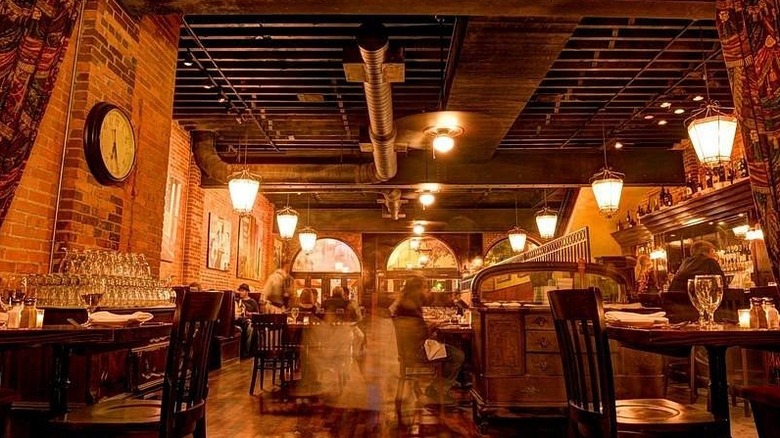 Rustic exposed beam interiors of Circa 1992 restaurant