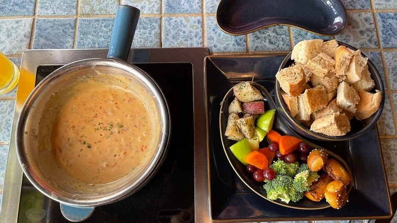 Fondue pot with croutons and vegetables from Little Dipper