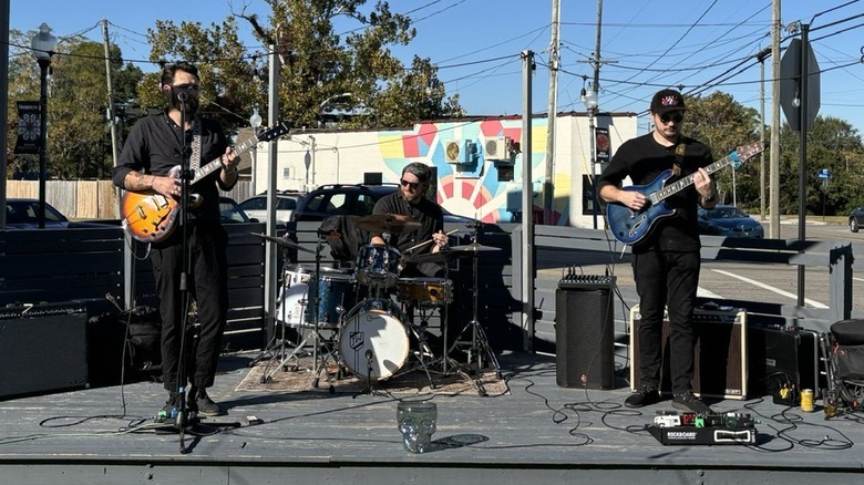 A band plays music during Wilmington's social district time