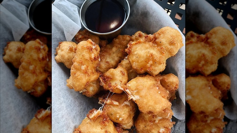 closeup of pancake battered cheese curds and syrup at Black Sheep Milwaukee