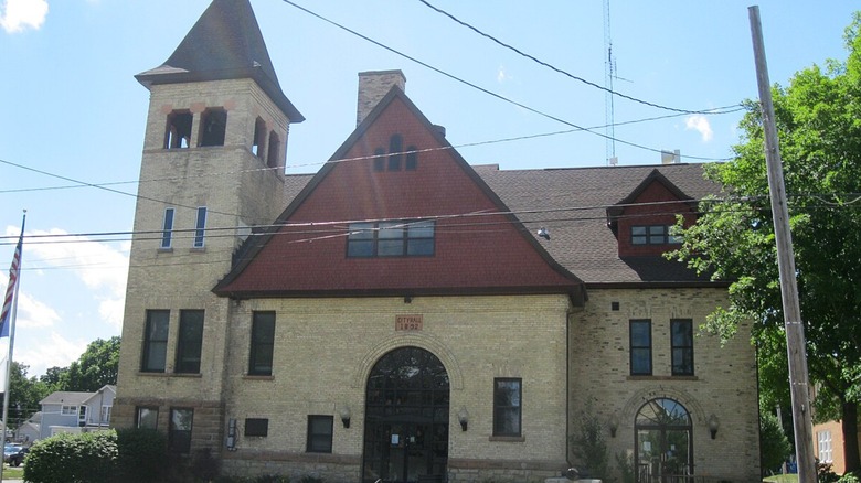 Historic Evansville City Hall, a brown and red Richardsonian Romanesque style building