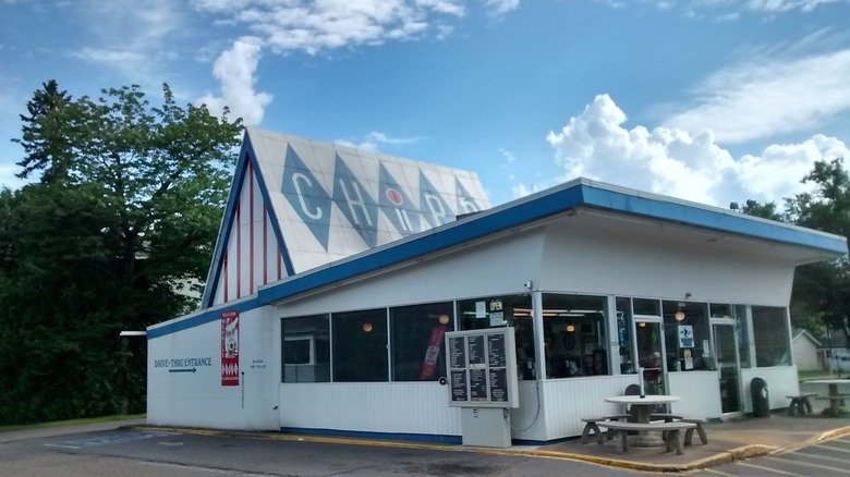 A retro burger restaurant with a sign reading Chips