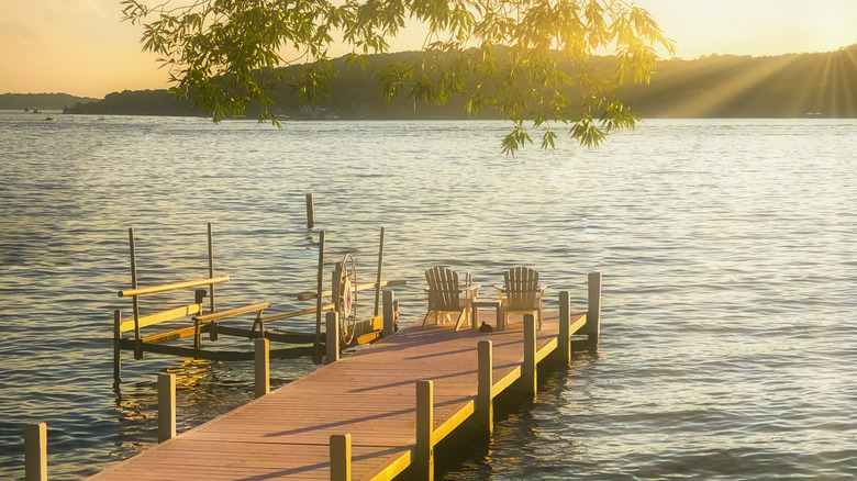 Pier with two chairs in the sunset at Geneva Lake, Wisconsin