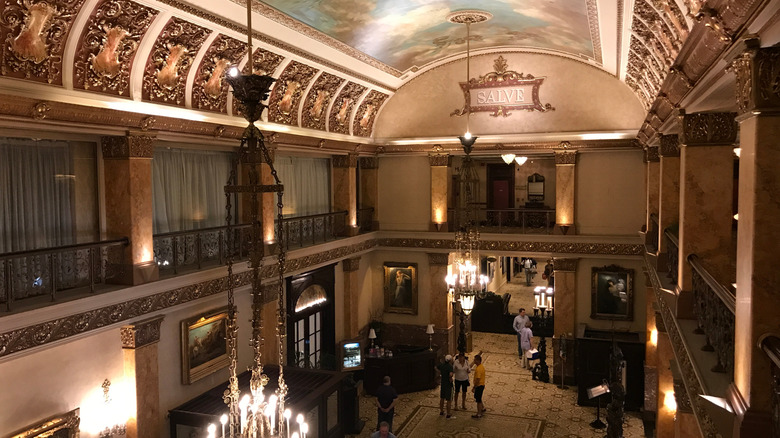 Inside the lobby of the Pfister Hotel in Milwaukee with gilded ceiling