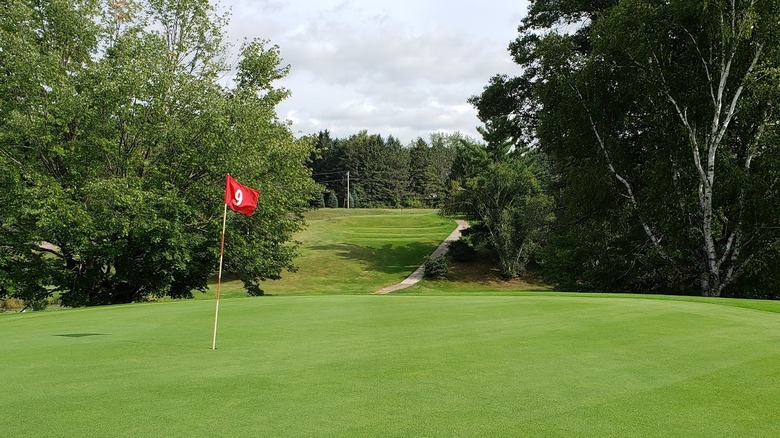 The verdant greens of Taylor's Amacoy Golf, next to Amacoy Lake in Wisconsin.
