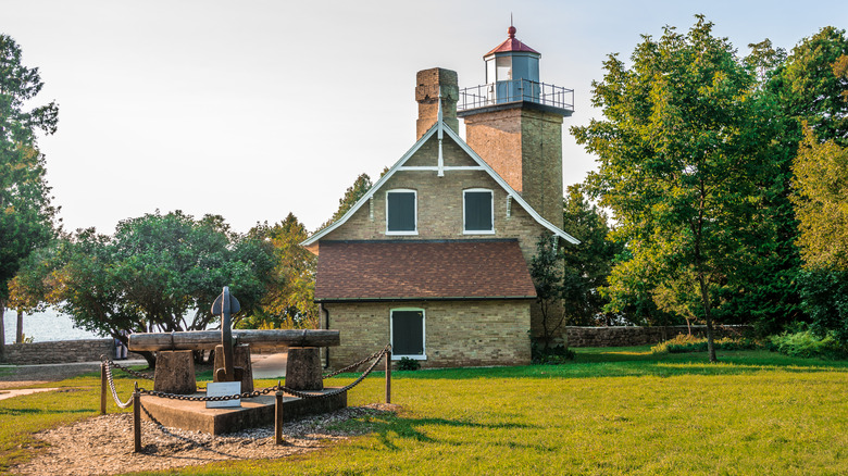 Historic Eagle Bluff Lighthouse surrounded by trees