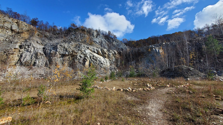 A trail leading past rock art in Rib Mountain Quarry near Wausau, Wisconsin