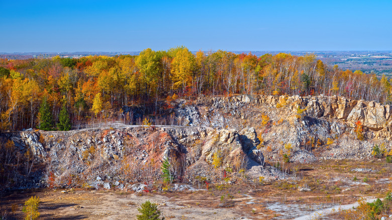 Rocky ridges and pretty fall trees at Rib Mountain Quarry in Wisconsin