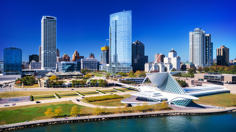 Wide view of downtown Milwaukee with Lake Michigan in foreground