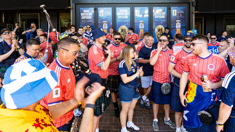 Scottish fans celebrate outside of Irish pub in Boston