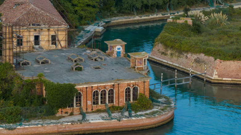 Aerial view of the plagued ghost island of Poveglia in the Venetian lagoon