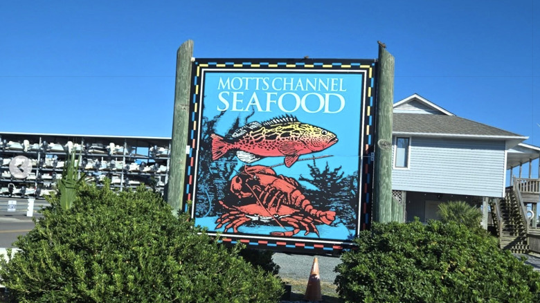 The Motts Channel Seafood sign outside of the market