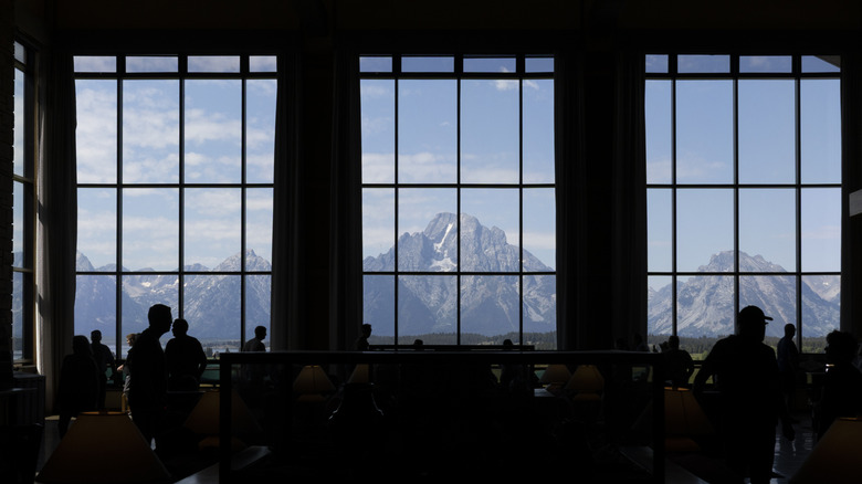Views of Teton Range from tall windows at Jackson Lake Lodge