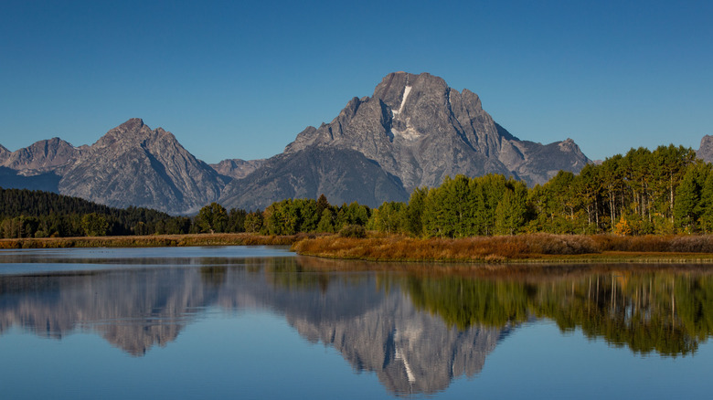 Mt. Moran reflected in clear water of Jackson Lake