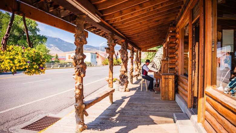 A man playing the piano at western style shops in Dubois, Wyoming