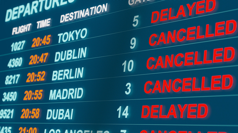 flight cancellations on airport monitor