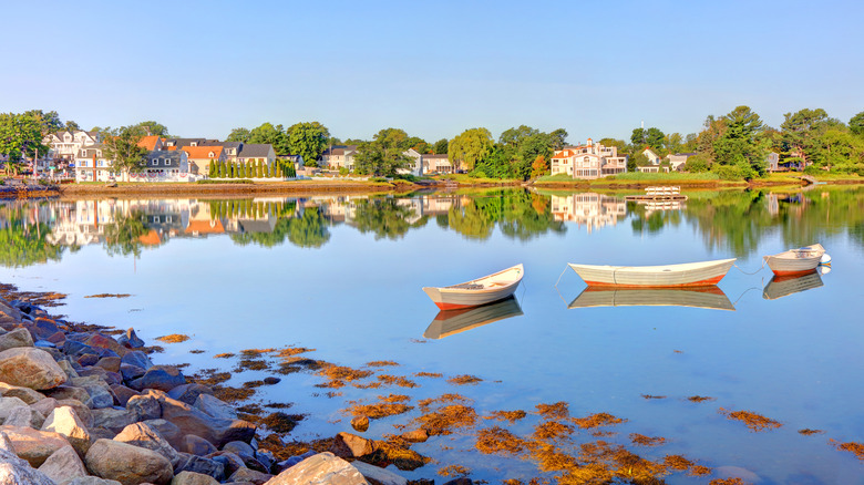 Boats float on open water as still as glass in Kennebunkport, Maine