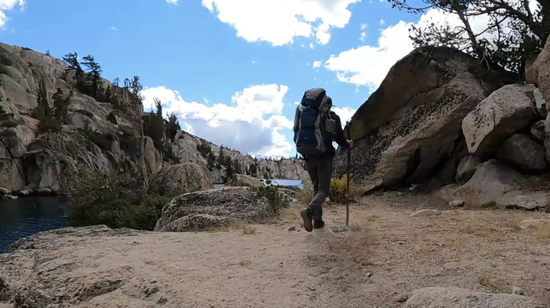 A lone hiker along the Benson Lake Loop