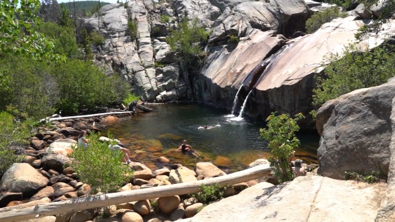 people swimming in Popo Agie Falls, Wyoming