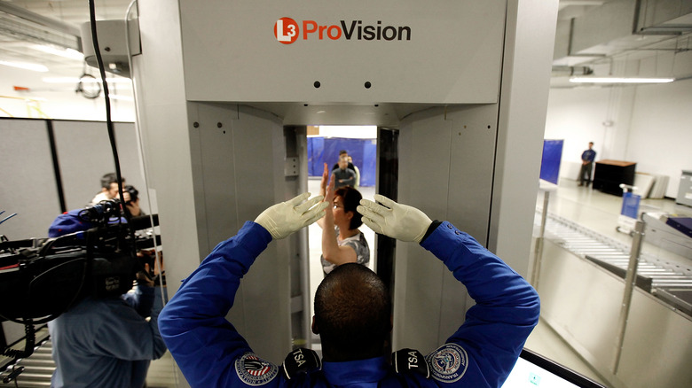 Man yawning in security line at LAX