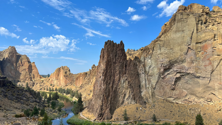 A state park with stunning towering mountains and a lush river running between them