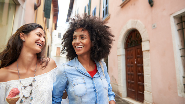 friends laughing in European street