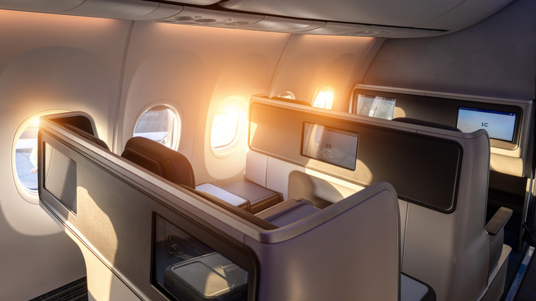 Business class seats inside an airplane