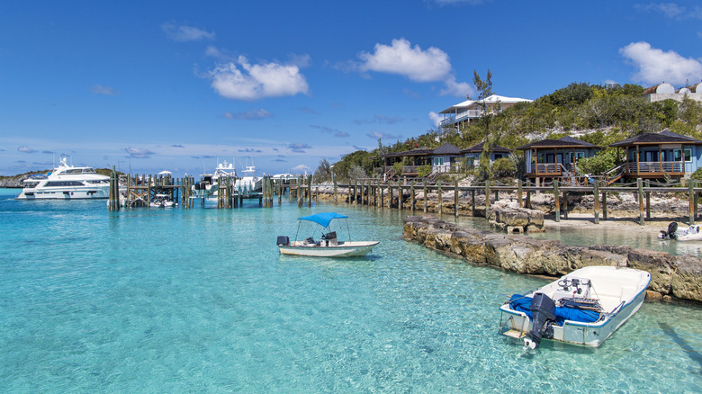 View of Staniel Cay Yacht Club in the Bahamas with views of bungalows and yachts