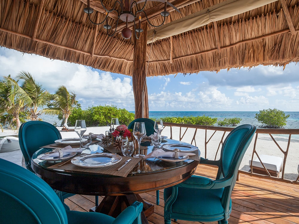 Outdoor dining under a palapa
