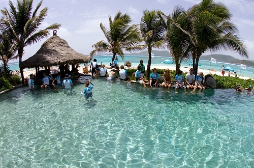 HIHOers relax in Sir Richard's beachside pool on Necker Island.