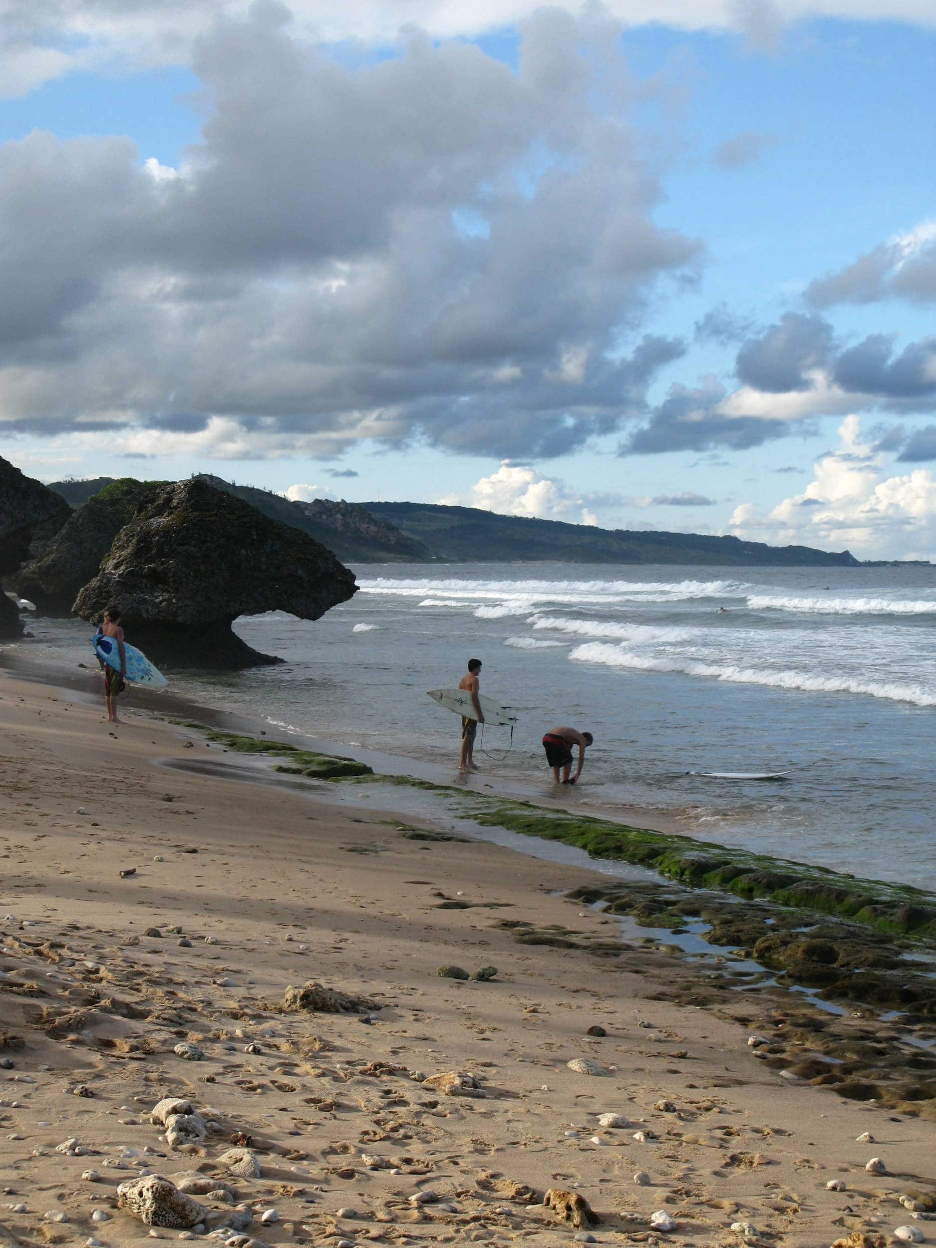 Surfers launching at Parlours, just south of Soup Bowl.