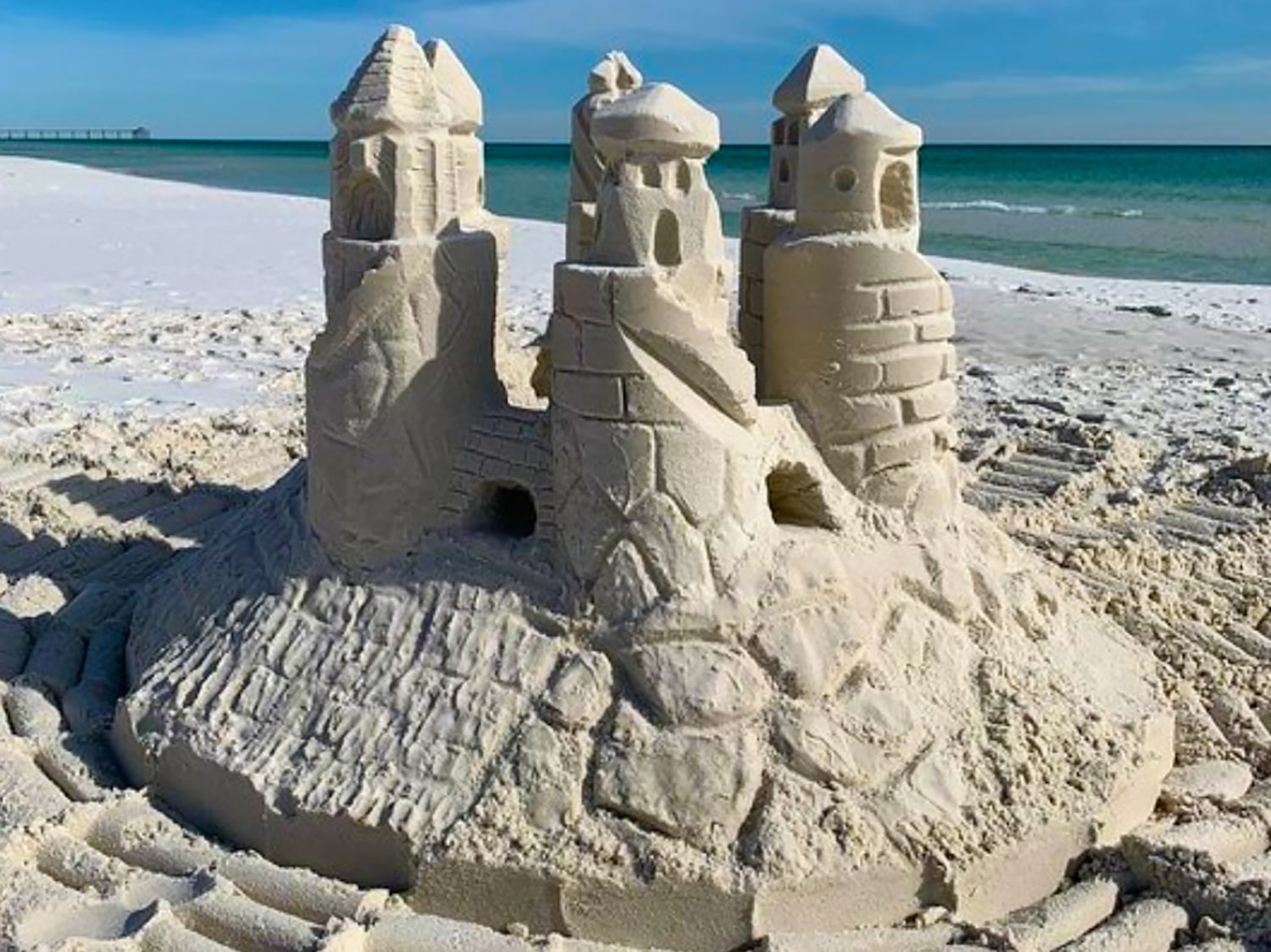 Large sand castle on the beach