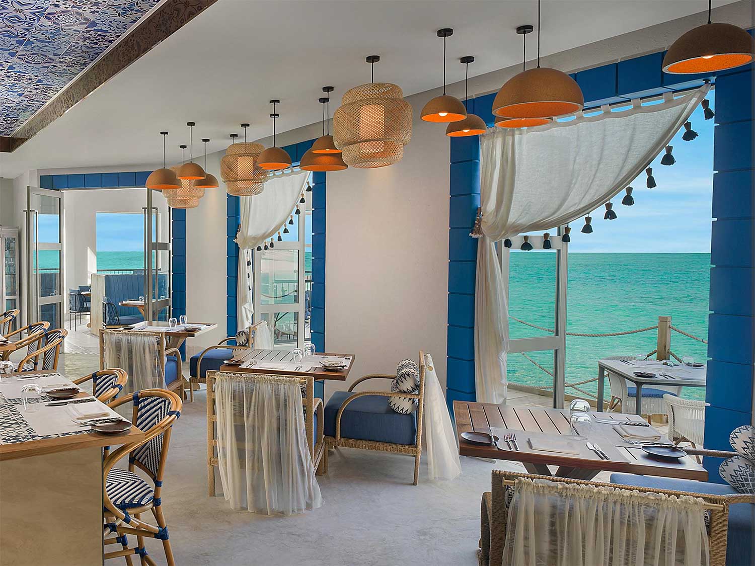 A dining interior of an island beach resort.