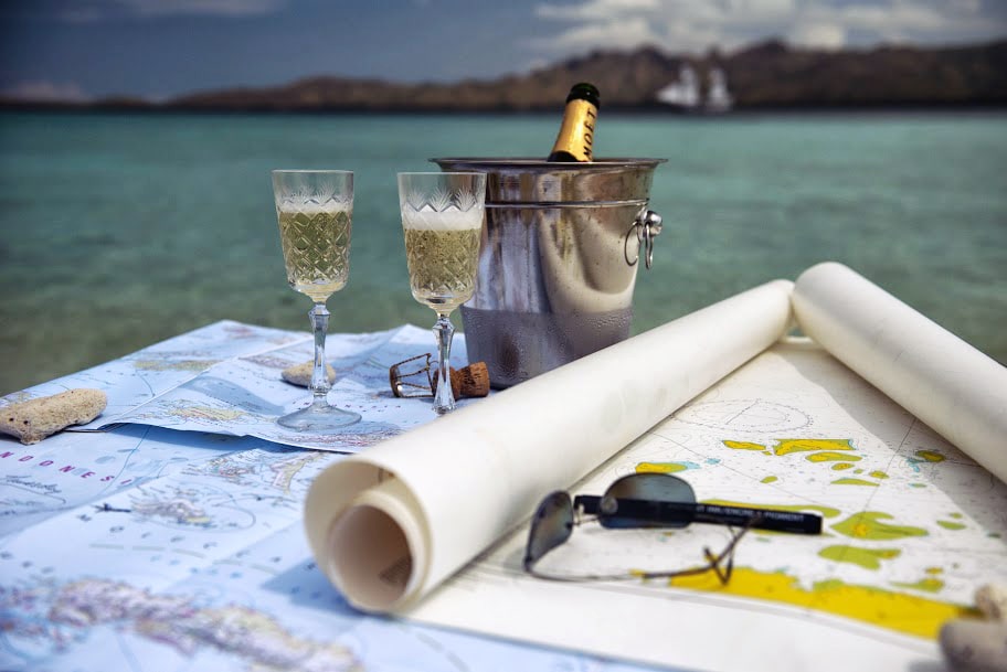 Exotic Travel: The Newest Luxury Cruise Ship: Alexa Glass of Champagne on Beach