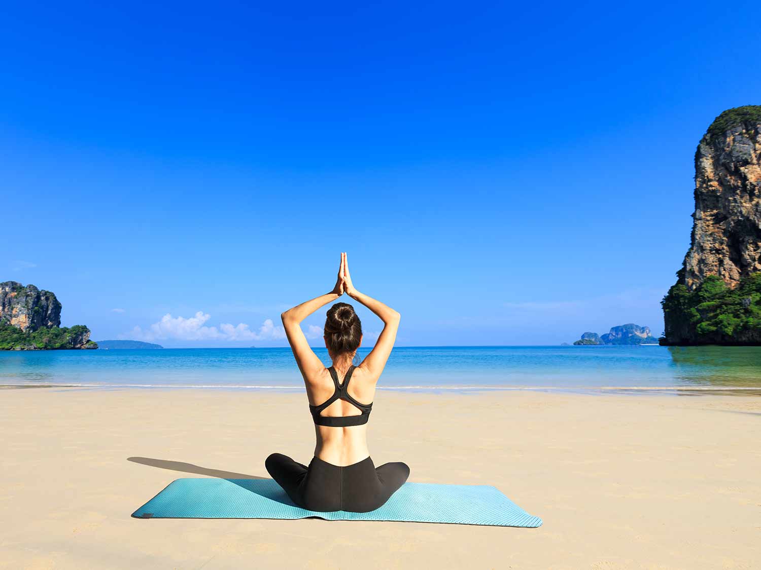 beach yoga shutterstock