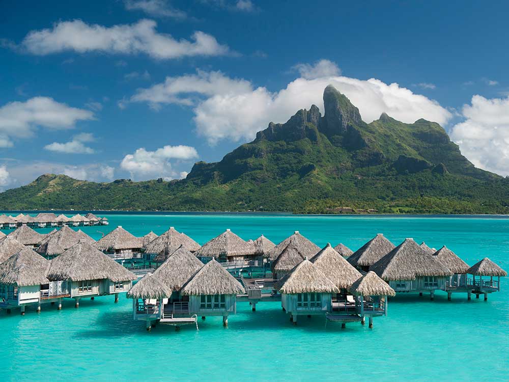 Overwater bungalows at The St. Regis Bora Bora Resort