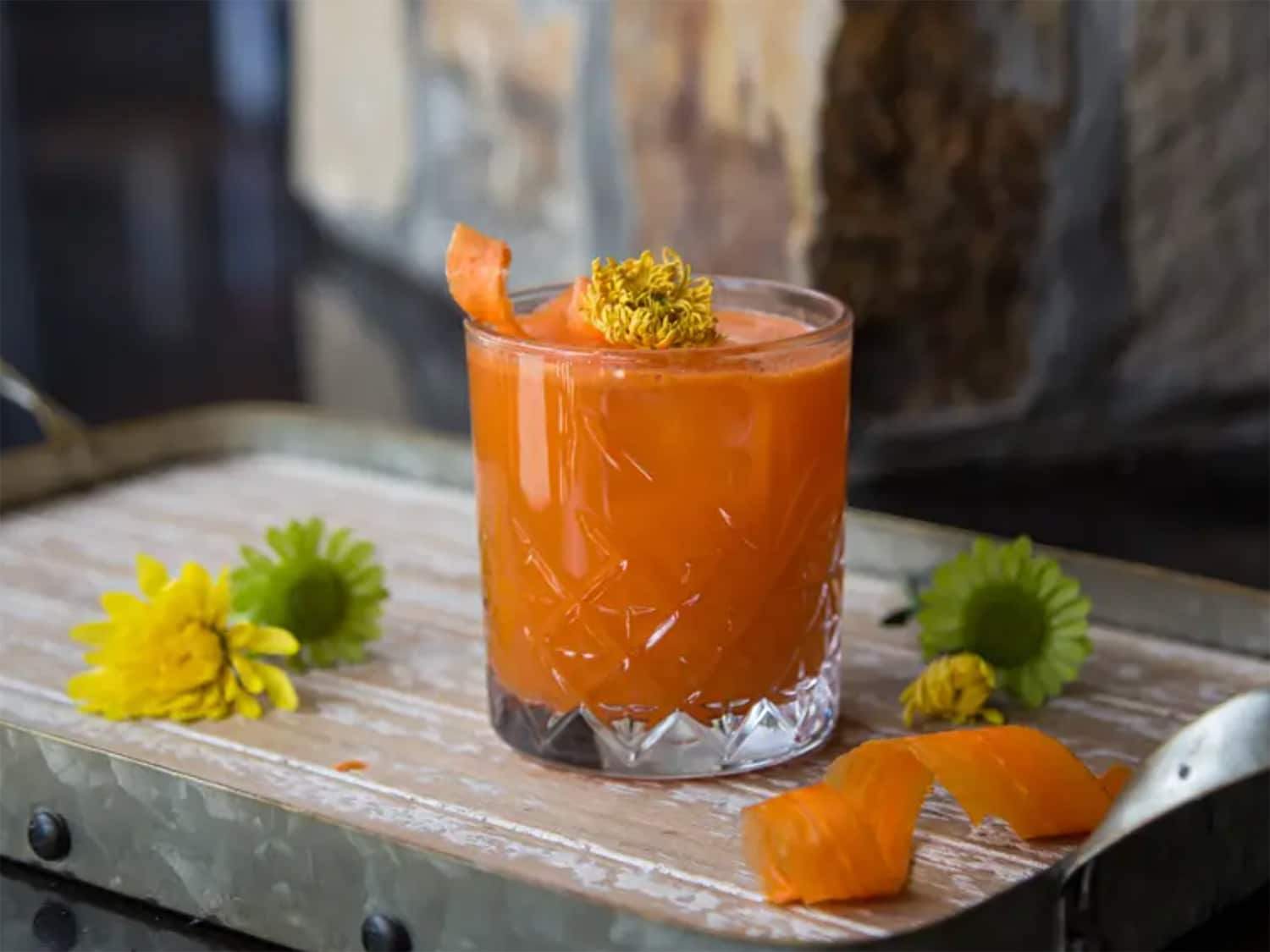 A cocktail glass on a table.