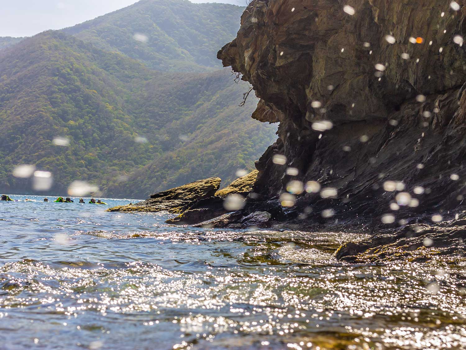 A seaside cliff by the water.