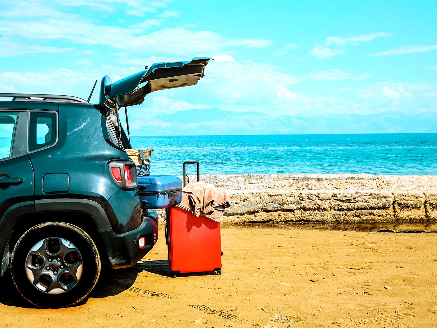 car at the beach