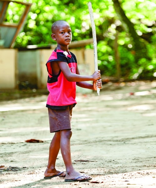 Playing baseball with a palm branch