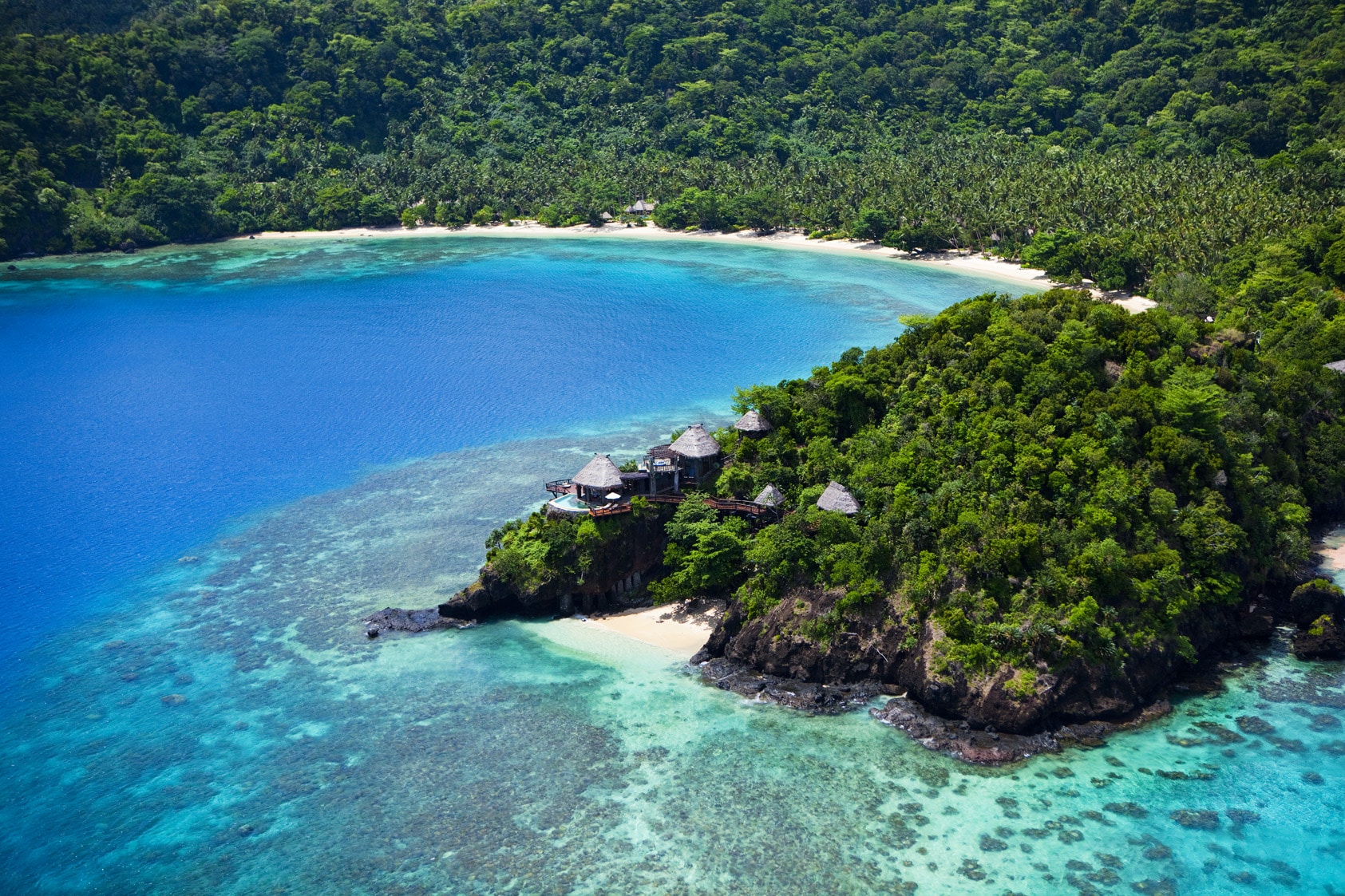 An aerial view of the beach at Seagrass Bay, next to Como Laucala Island in Fiji.