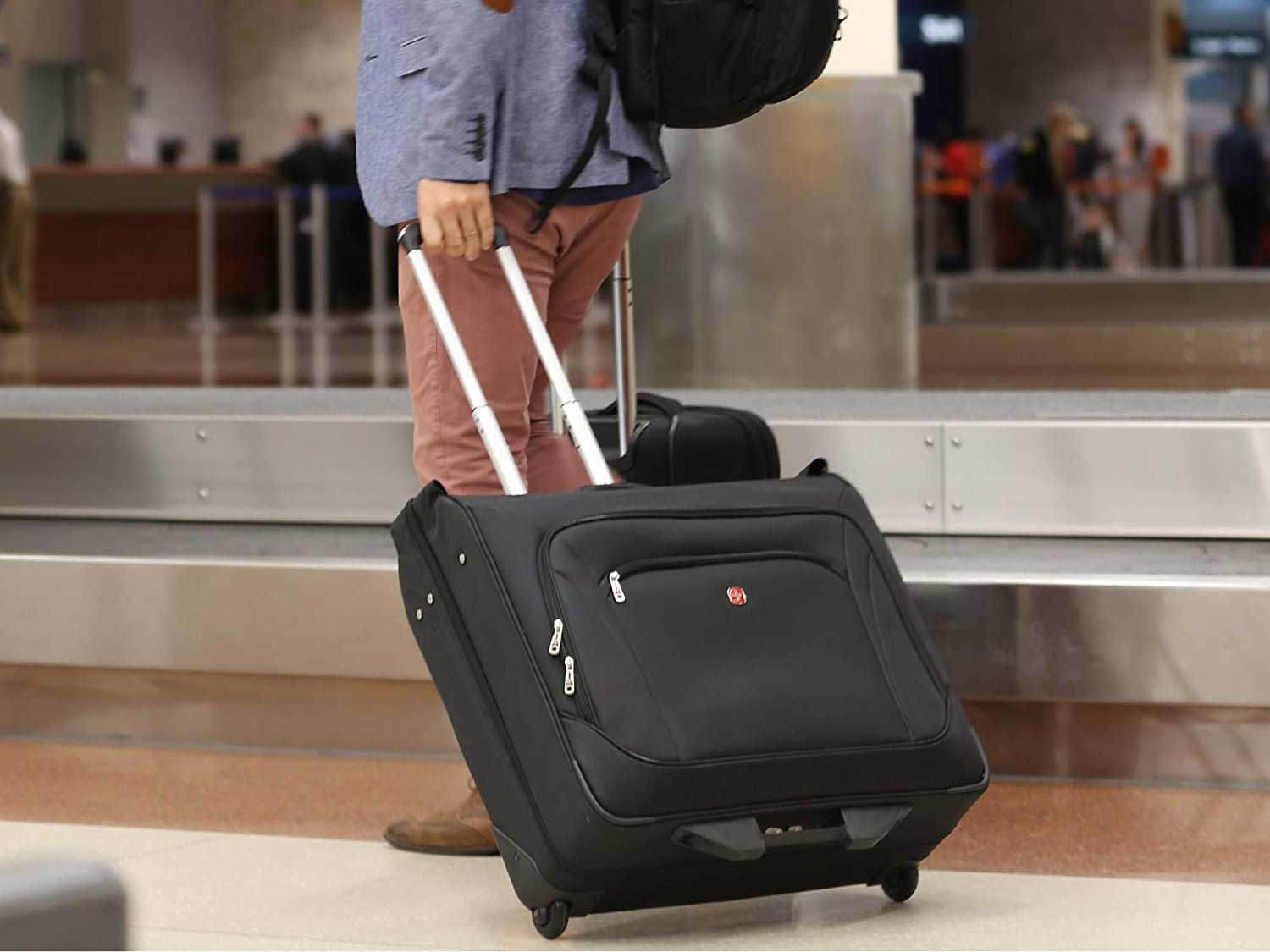 Man with a garment bag.