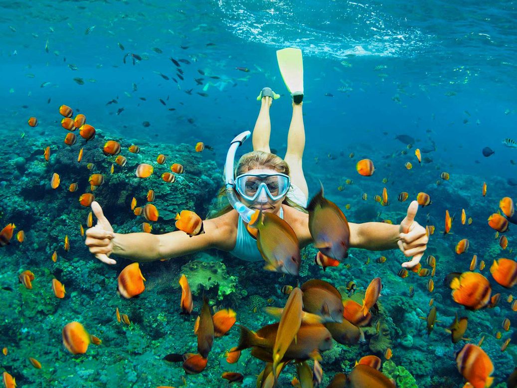 A man snorkeling underwater.