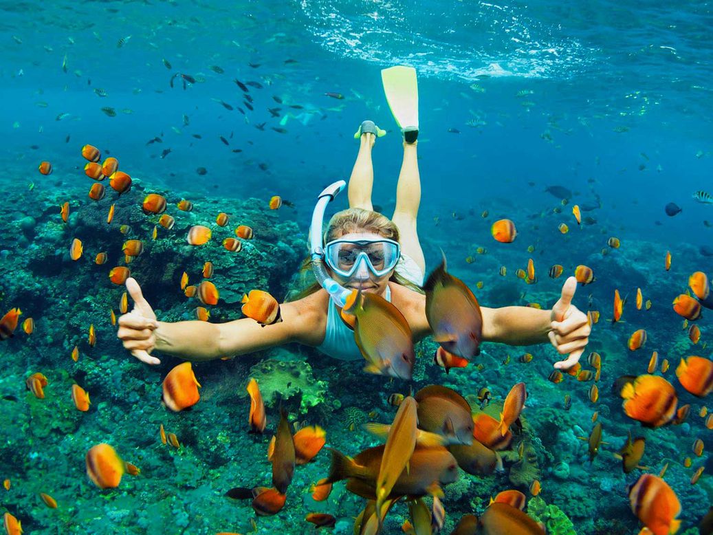 A man snorkeling underwater.