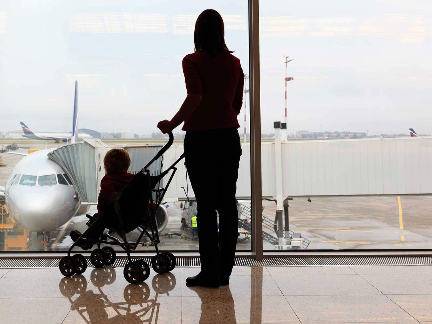 Woman with stroller at the airport