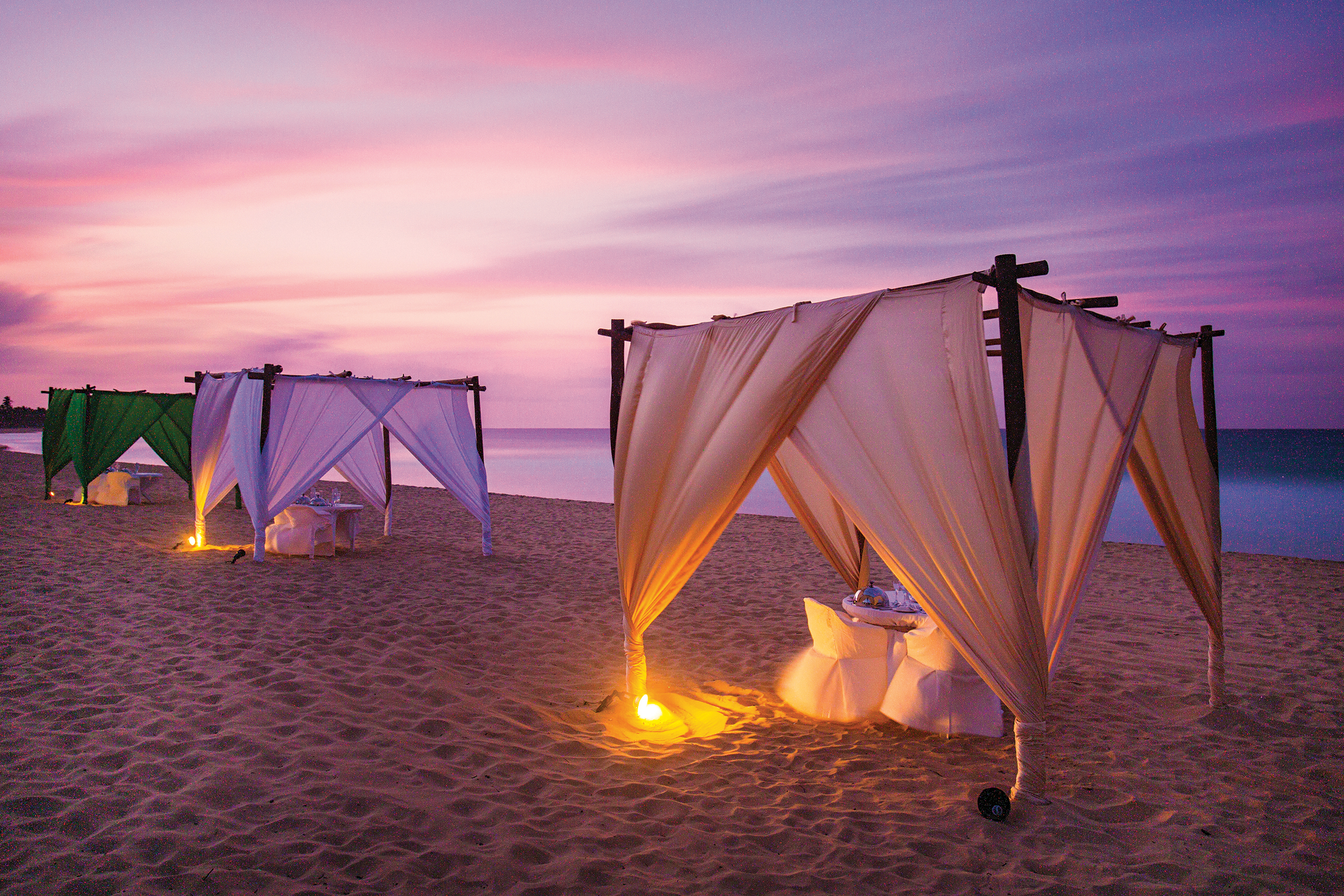Beach tents at sunset in Punta Cana, Dominican Republic