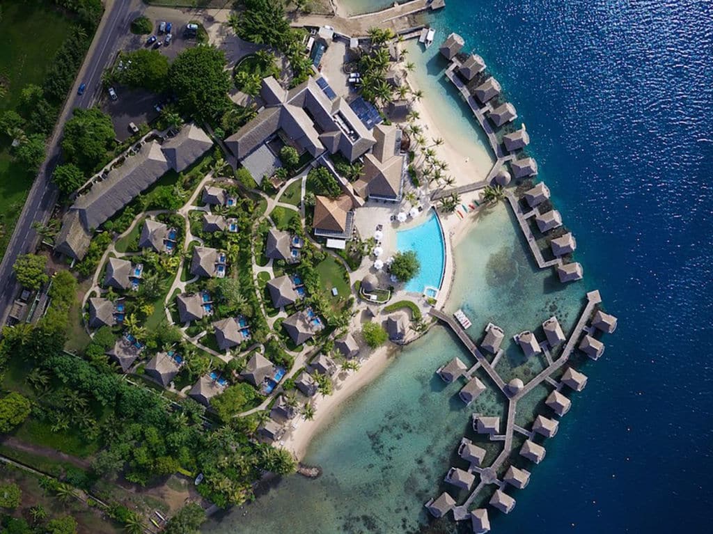 An aerial look at the overwater bungalows at Manava Beach Resort and Spa