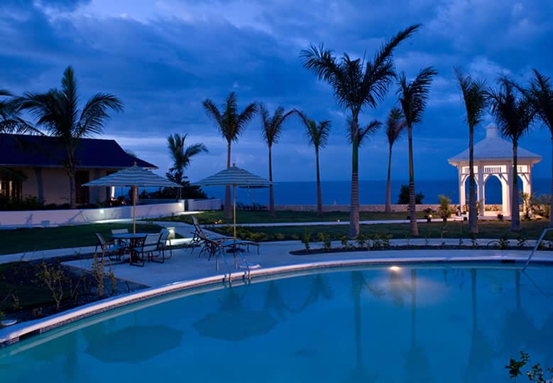 Evening view of pool at Moon Dance Cliffs, Jamaica